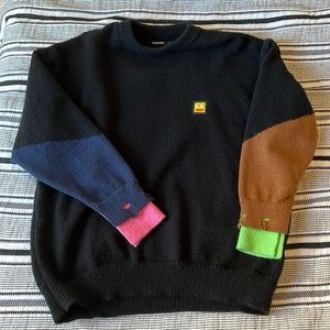 Sweater with color blocked sleeves